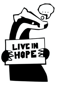A badger holding a sign to say Live in Hope